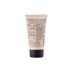 Thrive Natural Care tube next to hand showing product size and portability