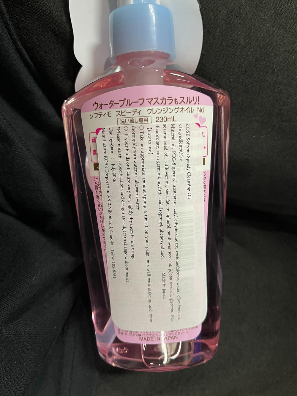 Thunder Tech KOSE Softymo bottle held in hand showing 230ml scale for lasting use