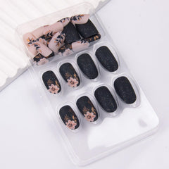 Thuoxde application photo of pressing a fake nail on finger for easy at-home use