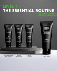 Tiege Hanley exfoliating scrub texture on fingertip showing fine particles for smooth skin