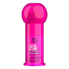 TIGI Bed Head cream texture on hand showing lightweight spreadability and shine