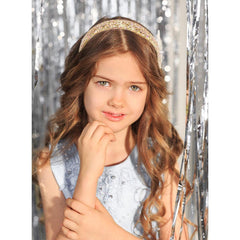 Tihebax headband clipped to school backpack showing everyday styling convenience