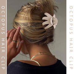 Tihebax clip holding a high bun on model showing reliable hold during activity benefit