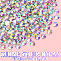TINKRSTUFF rhinestones placed on nail using tweezers and glue for precise decoration
