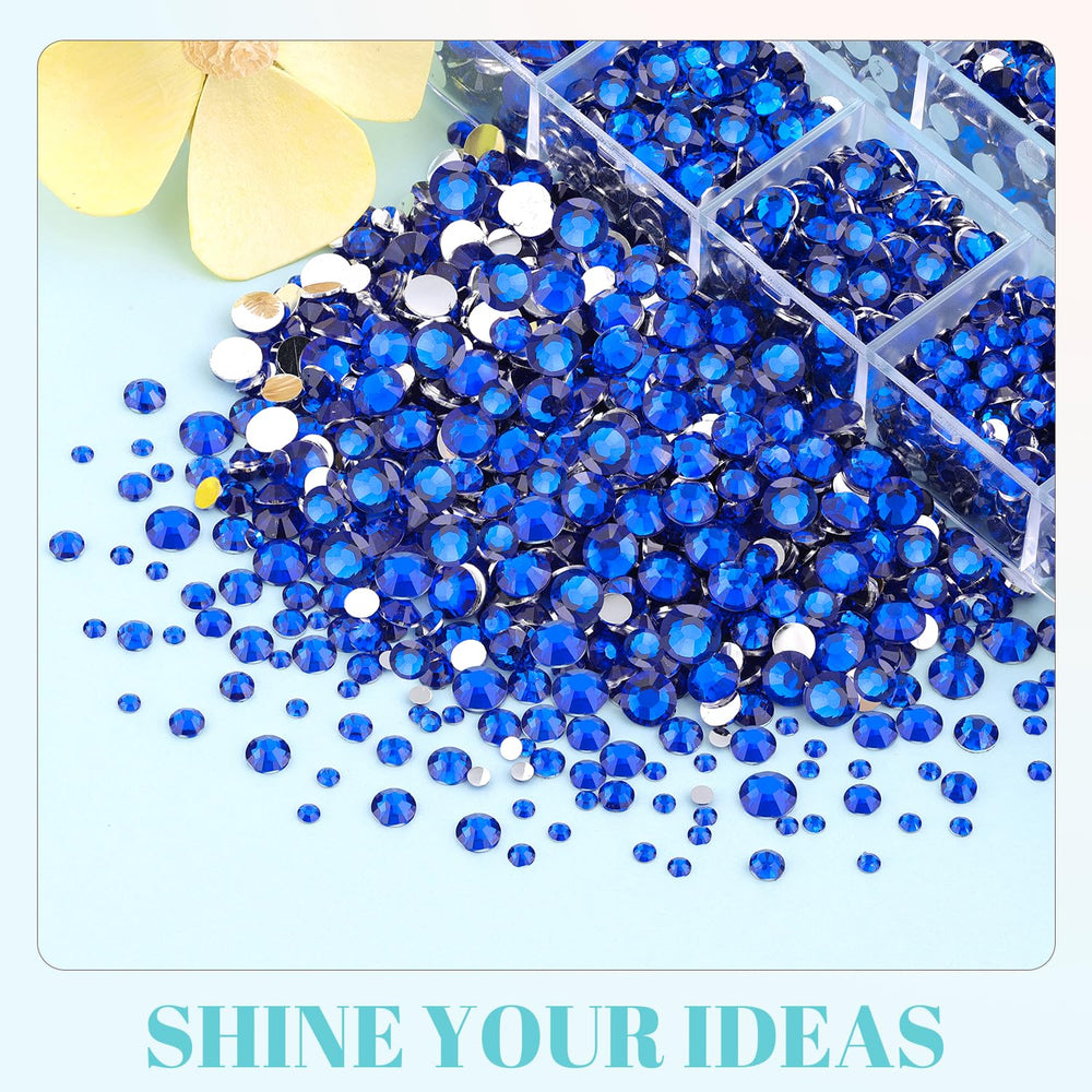 TINKRSTUFF rhinestones in hand to show scale and assortment benefit for projects