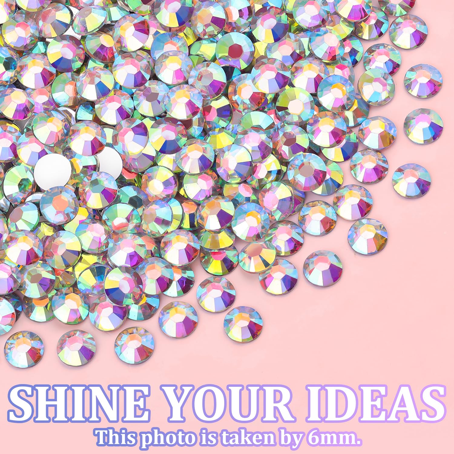 TINKRSTUFF rhinestones next to a hand for scale to visualize size assortment and coverage