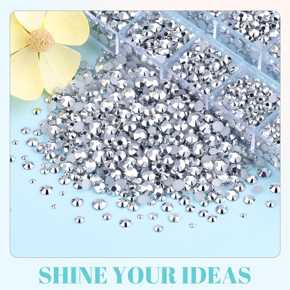 TINKRSTUFF rhinestones in hand for scale showing sizes and quantity benefit