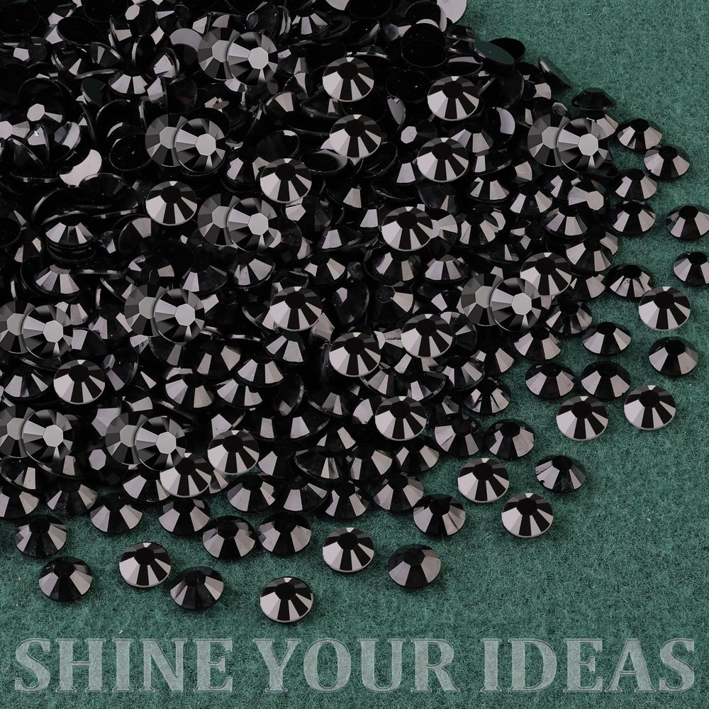 TINKRSTUFF rhinestones beside coin and ruler showing compact sizes and scale