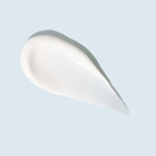 TIZO close-up cream texture highlighting sheer blendability benefit
