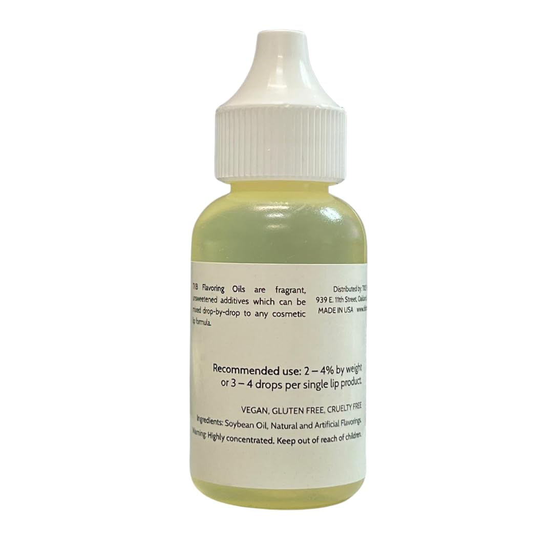 Close-up of TKB dropper dispensing strawberry flavor oil demonstrating precise control