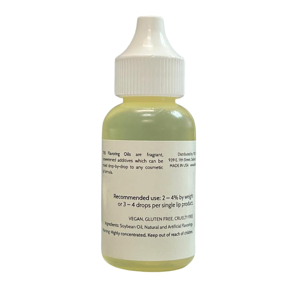 Close-up of TKB dropper dispensing strawberry flavor oil demonstrating precise control