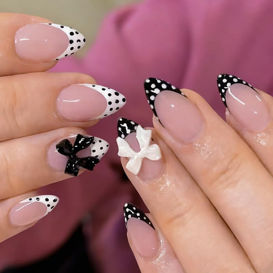 Tnampv front packaging showing full 24-piece press on nail kit and benefits
