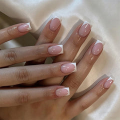 Tnampv front packaging displaying 24-piece white French tip set and tools for instant polish