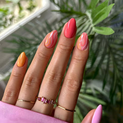 Tnbuokas close-up glossy almond nail texture showing shine and smooth finish benefit