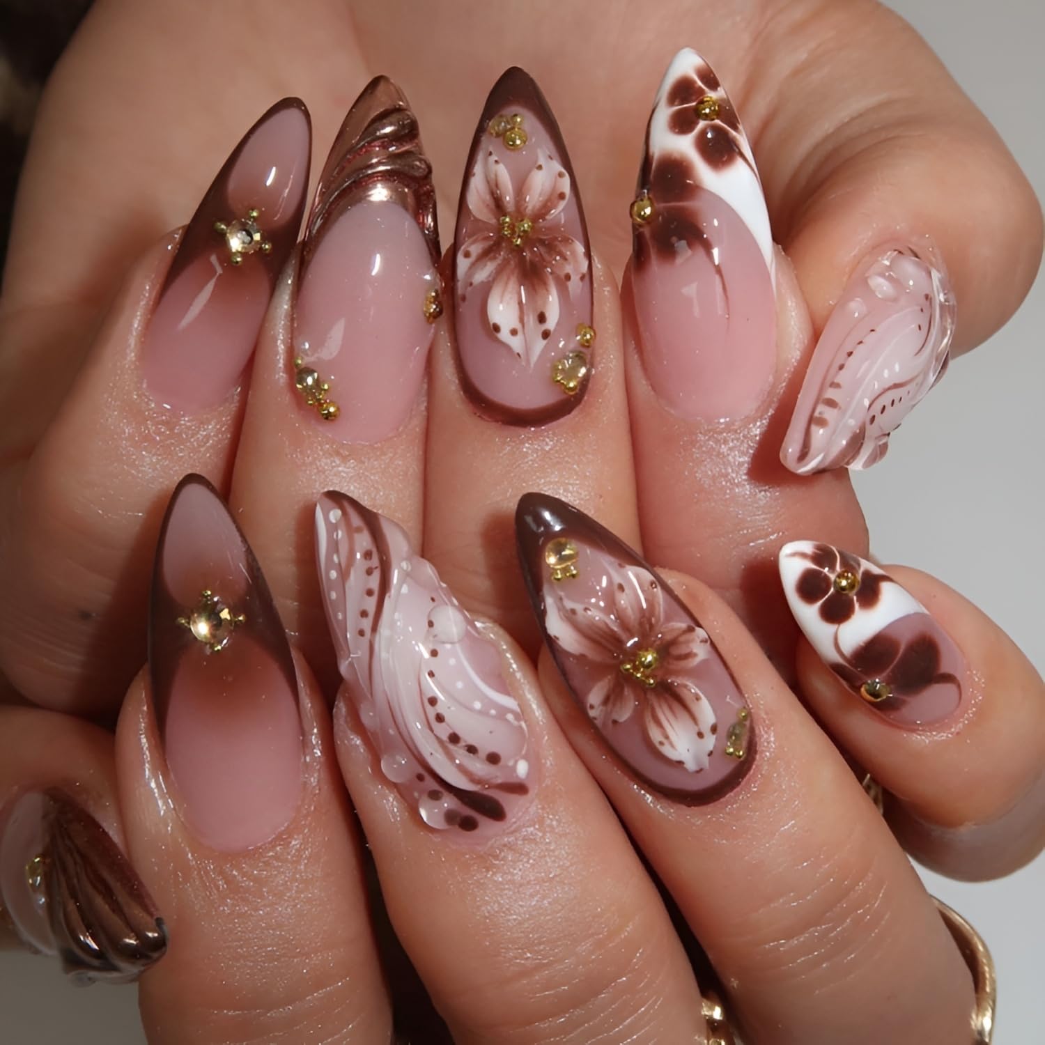 Tnbuokas close-up of brown flower and gold rhinestone detail enhancing elegance