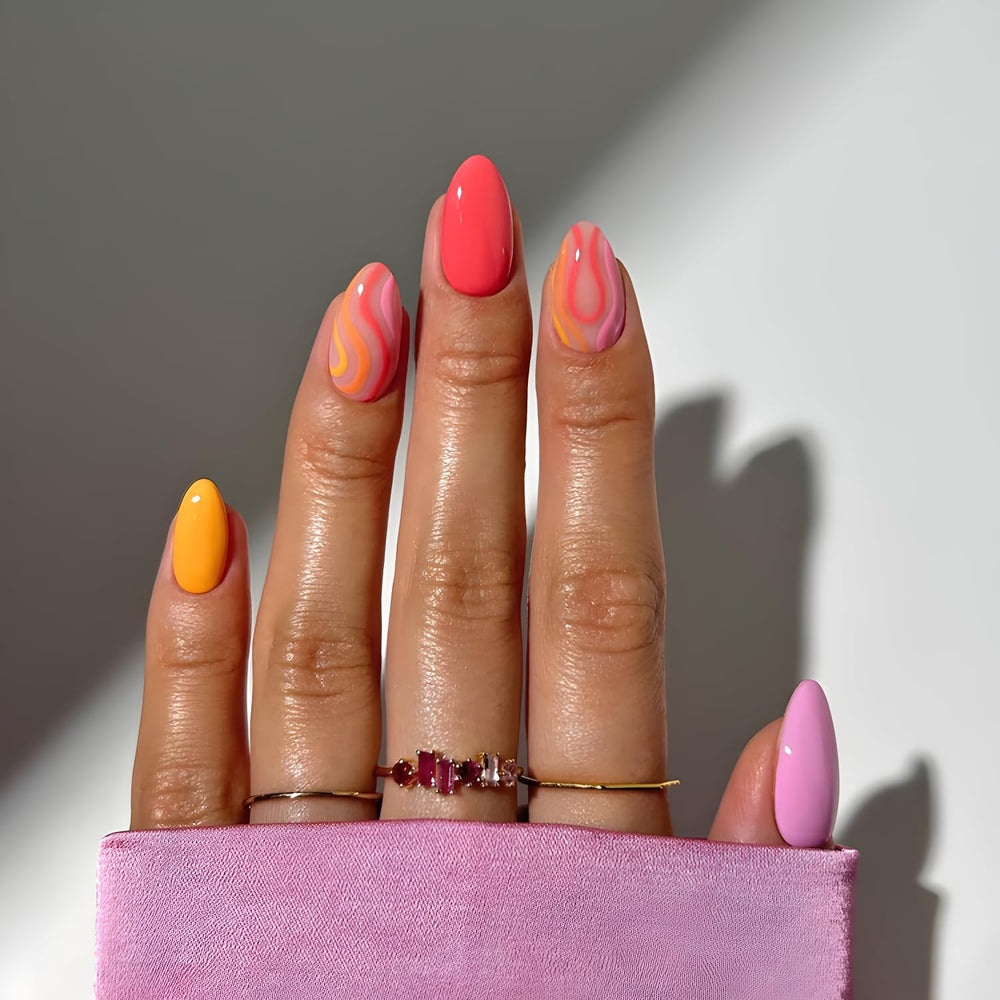 Tnbuokas front packaging showing colorful press on nails and included glue benefit convenience