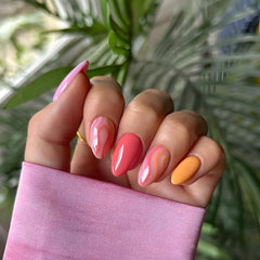 Tnbuokas nails in hand during application demonstrating easy press-on benefit