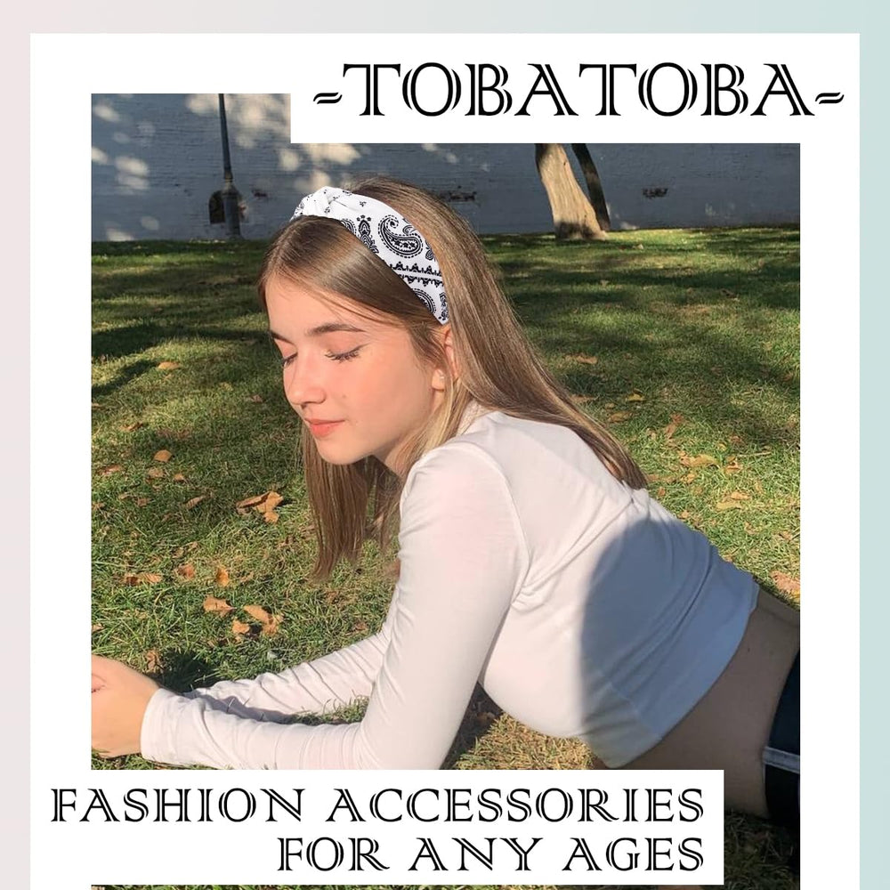 TOBATOBA headband next to hand for size comparison and fit clarity