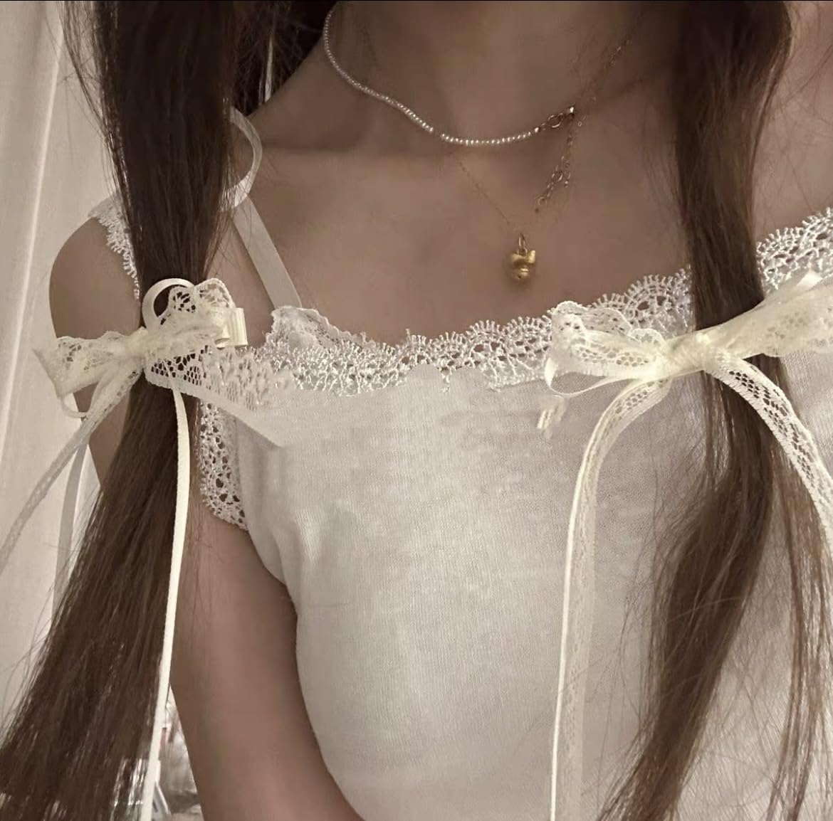 Tobeffect bow clipped in half-up hairstyle adding romantic detail to hair