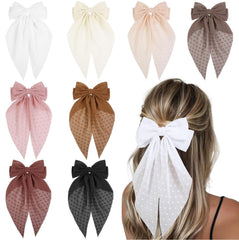 Tobeffect front view of eight assorted oversized bows, shows variety and styling options