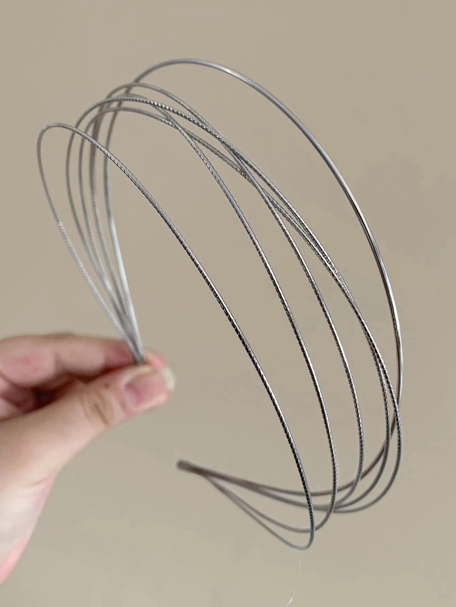 Tobeffect front view of two silver headbands showing clean packaging and modern design