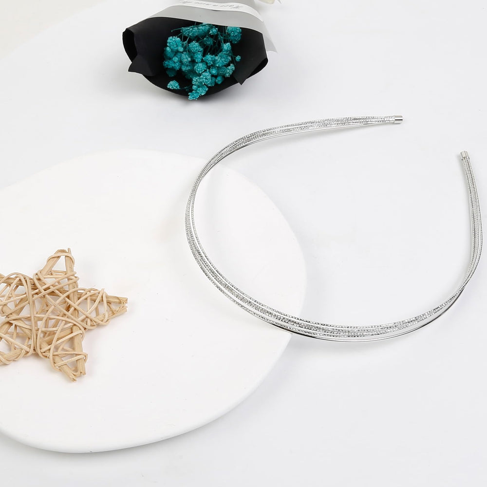 Tobeffect headband worn with hair down demonstrating subtle shine and quick styling