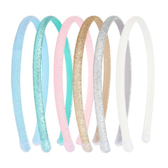 TODDER front view of six glitter headbands showing colors and packaging benefit