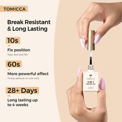 TOMICCA lifestyle shot of hands wearing press-ons for confident wear