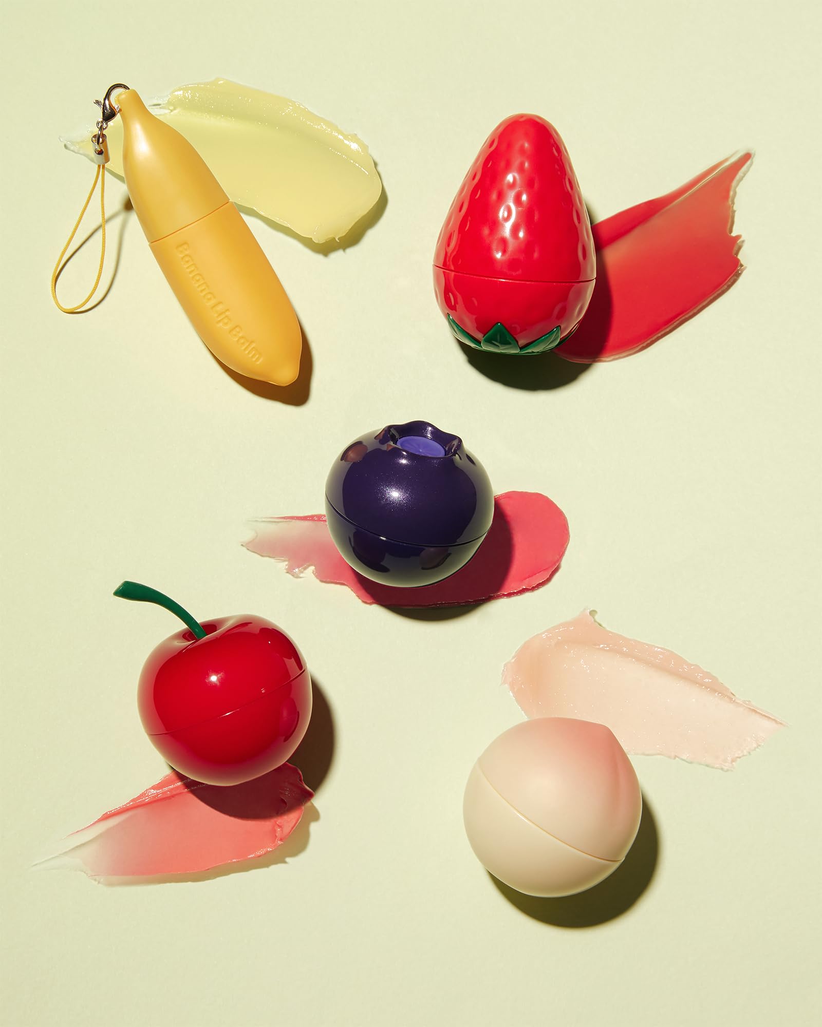 TONYMOLY cherry lip balm inside purse lifestyle shot showing on-the-go hydration benefit