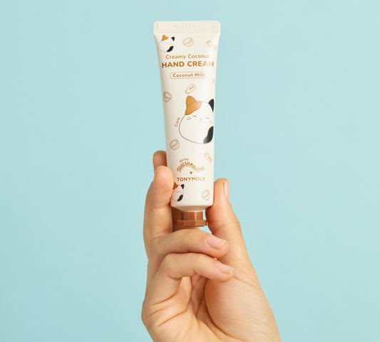 TONYMOLY coconut milk hand cream tube close-up showing creamy texture and hydration benefit