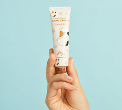 TONYMOLY coconut milk hand cream tube close-up showing creamy texture and hydration benefit