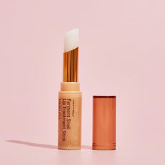 TONYMOLY applying balm to lips close-up for instant softening benefit