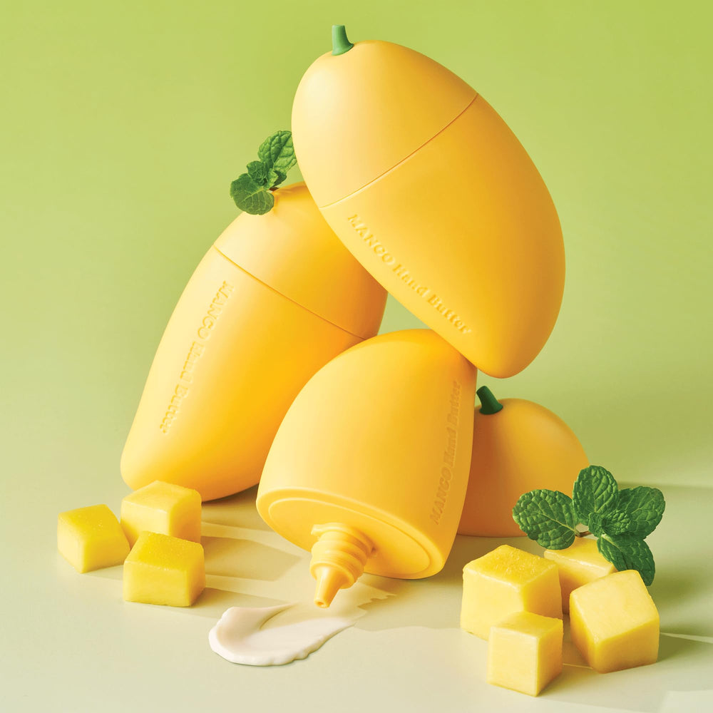 TONYMOLY hand applying mango hand butter for immediate hydration and softening benefit