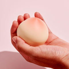 TONYMOLY open tube showing creamy texture and fast-absorbing formula benefit
