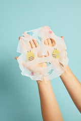 TONYMOLY model wearing sheet mask showing fit and calming effect for relaxed skin