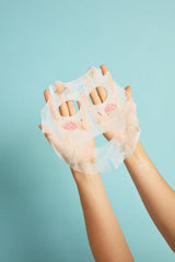 TONYMOLY glossy serum texture on fingers showing hydrating formula and fast absorption benefit