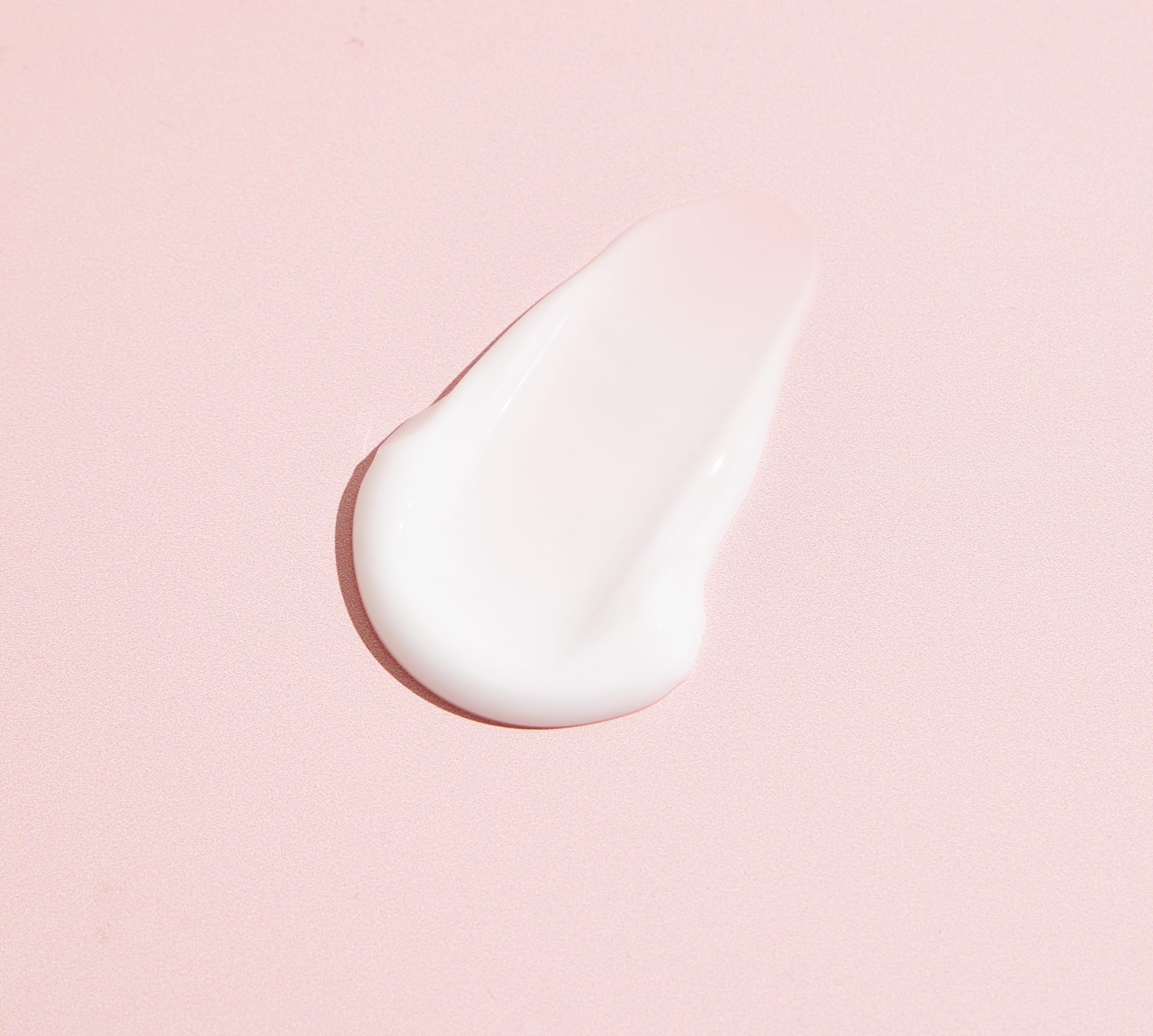 TONYMOLY cream in bathroom setting applied on hand, demonstrates soft plump skin