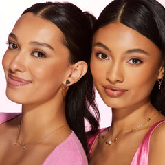 Too Faced bronzer on bathroom counter offering everyday routine inspiration