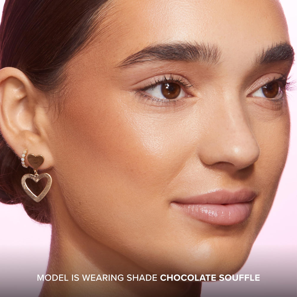Too Faced arm swatch showing Chocolate Souffle pigment for easy shade evaluation benefit