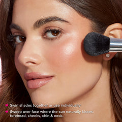 Too Faced brush picking up product demonstrating smooth application and buildability