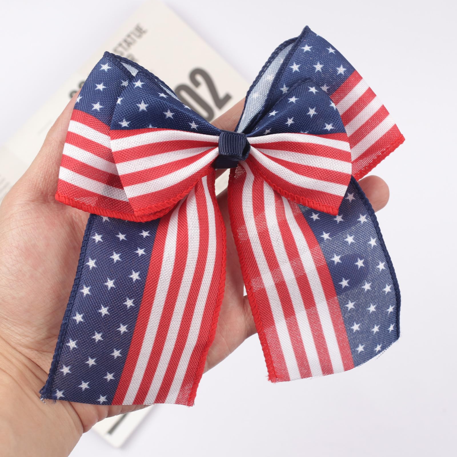 Totelux bow paired with patriotic outfit illustrating coordinated Independence Day styling