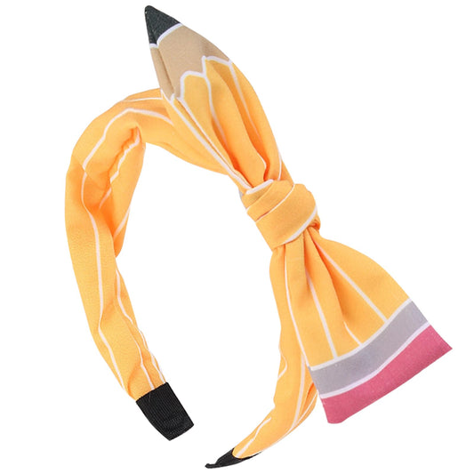 Totelux front view of yellow pencil headband showing playful classroom style and neat hold