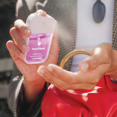 Touchland flatlay of all five bottles showing set completeness and gifting appeal