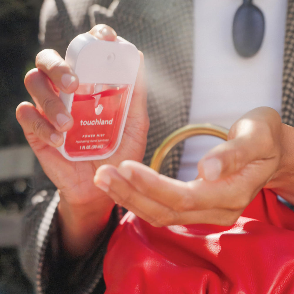 Touchland used outdoors in lifestyle scene showing convenient everyday use