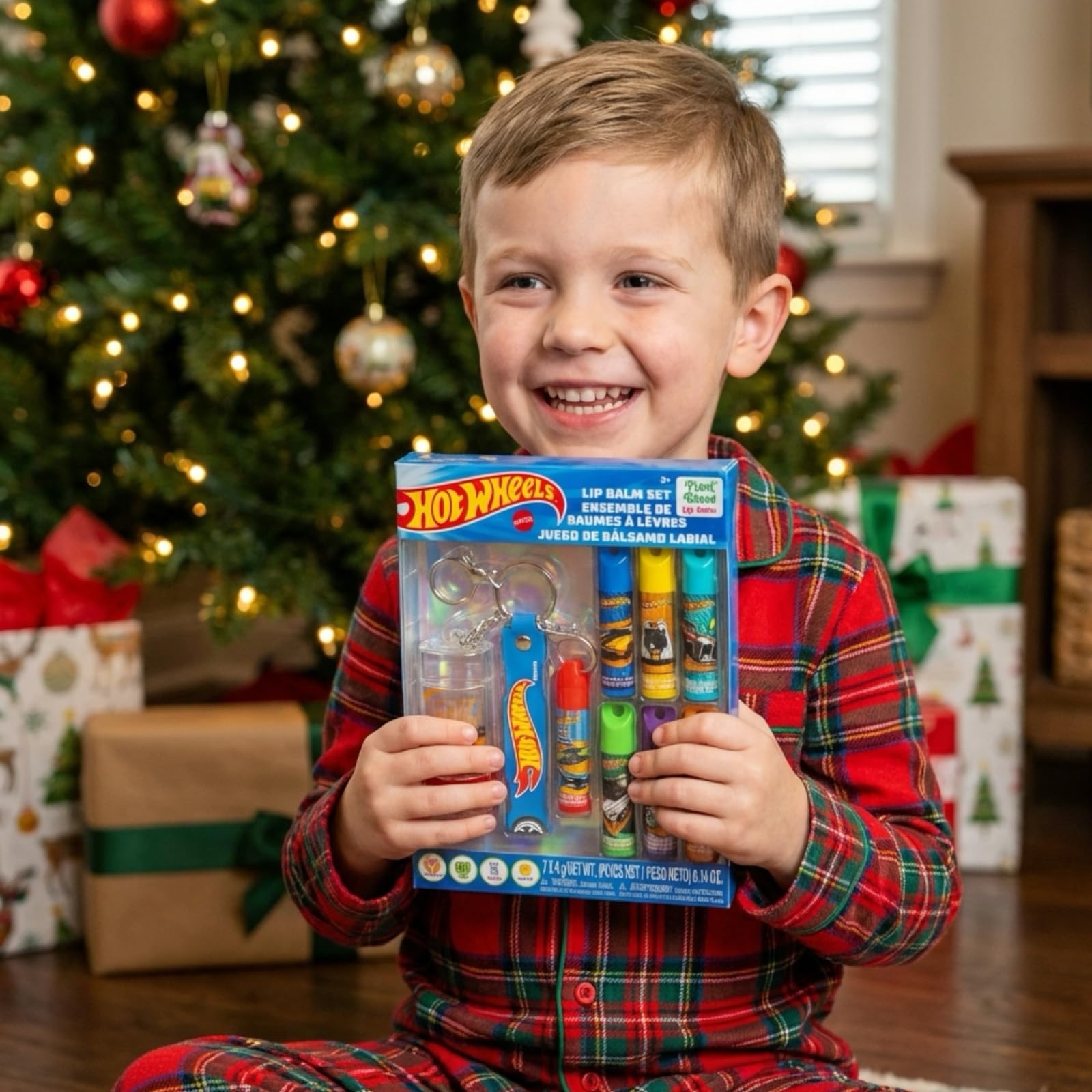 Townley Girl Hot Wheels lifestyle shot of kid holding balm showing playful use benefit: kid-approved design