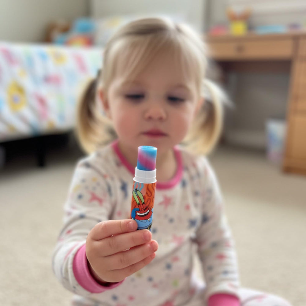 Townley Girl kids applying lip balm smiling showing gentle hydration benefit