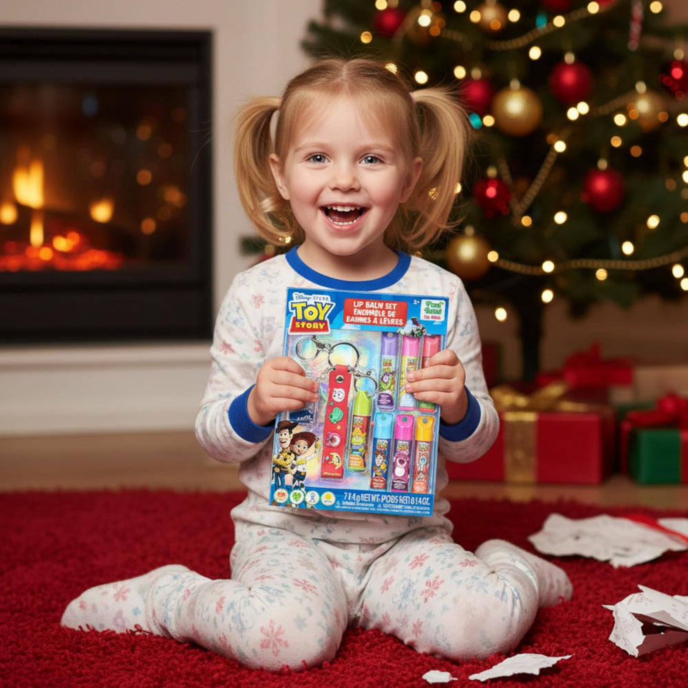 Townley Girl tube next to a hand showing compact kid-friendly size for pockets