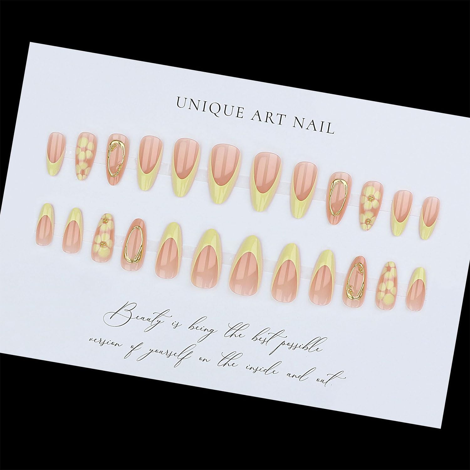 Toypoels hand applying a press-on nail demonstrating easy at-home use