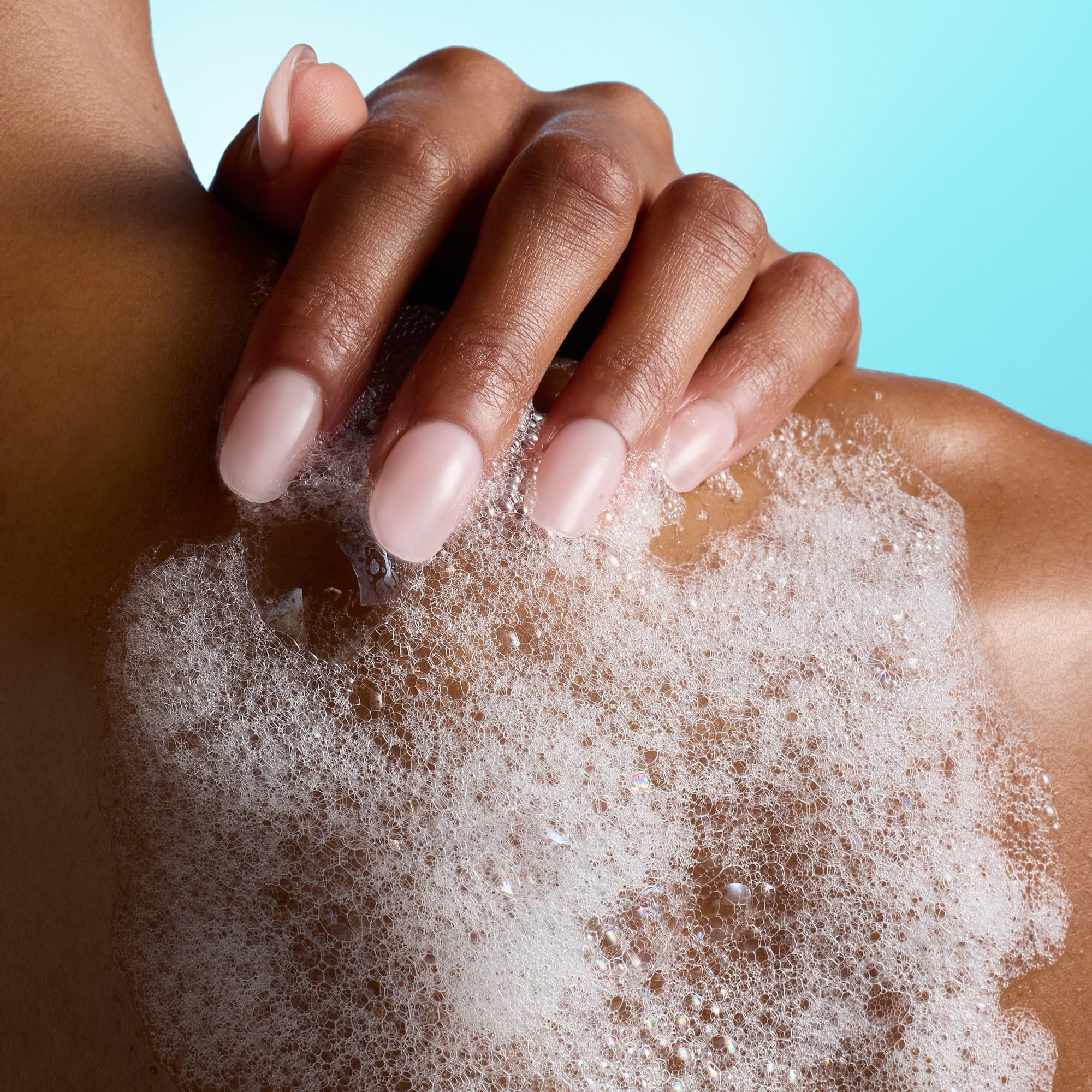 Tree Hut creamy foam on pouf demonstrating rich, luxurious cleanse