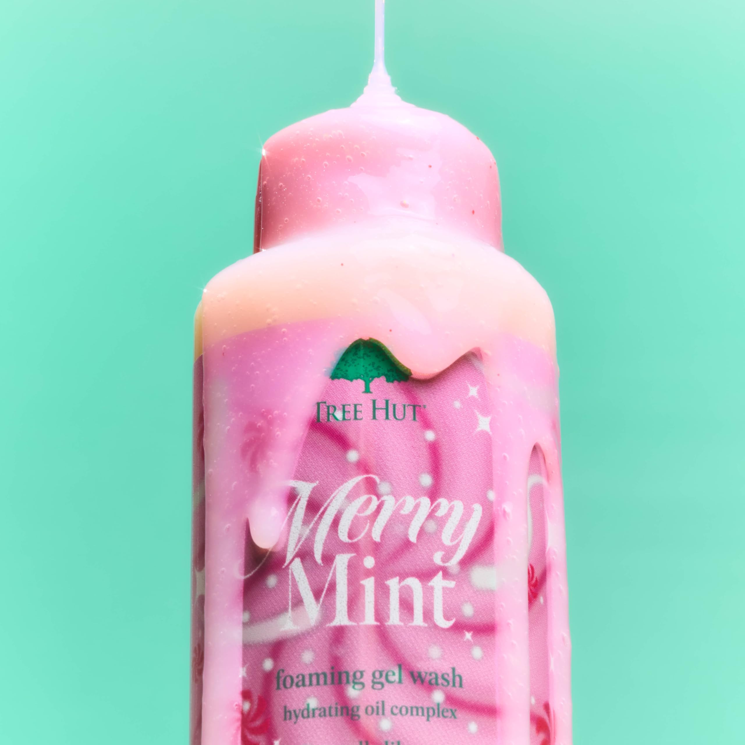 Tree Hut bottle placed in shower setting evoking refreshing daily use benefit